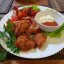 Куриные кусочки с соусом