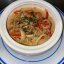 Тушеные кальмары с овощами