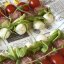 Канапе с салями,моцарелой, томатом чери и салатом