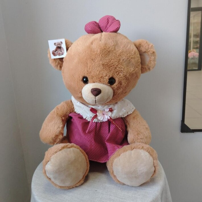 Мишка плюшевый дружелюбный