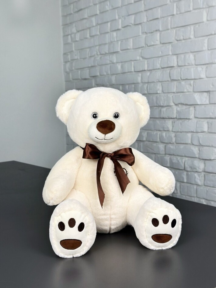 Игрушка мягкая «Медведь с бантом» белый