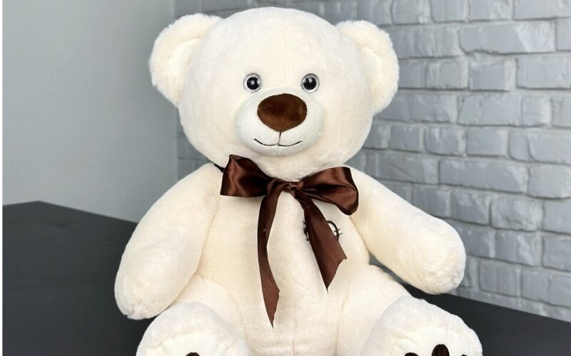 Игрушка мягкая «Медведь с бантом» белый