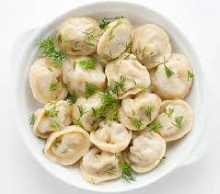 Пельмени отварные с маслом и сметаной