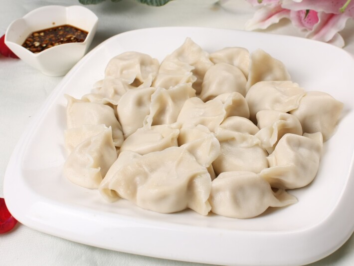 Пельмени со свининой и квашеной капустой