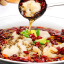 Отварные кусочки карпа с овощами в остром соусе