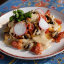 Драники с жареным салом, луком и соусом из белых грибов
