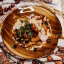 Деруны с жареным беконом, луком и соусом из белых грибов