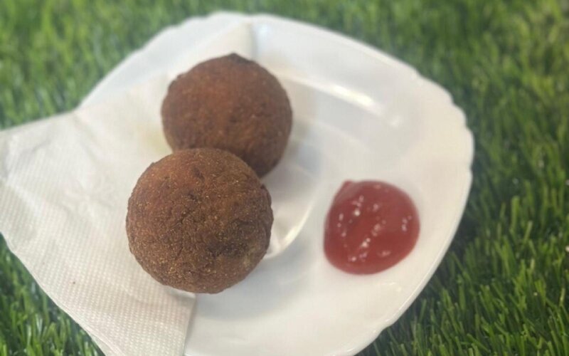 Two chicken cutlet with ketchup